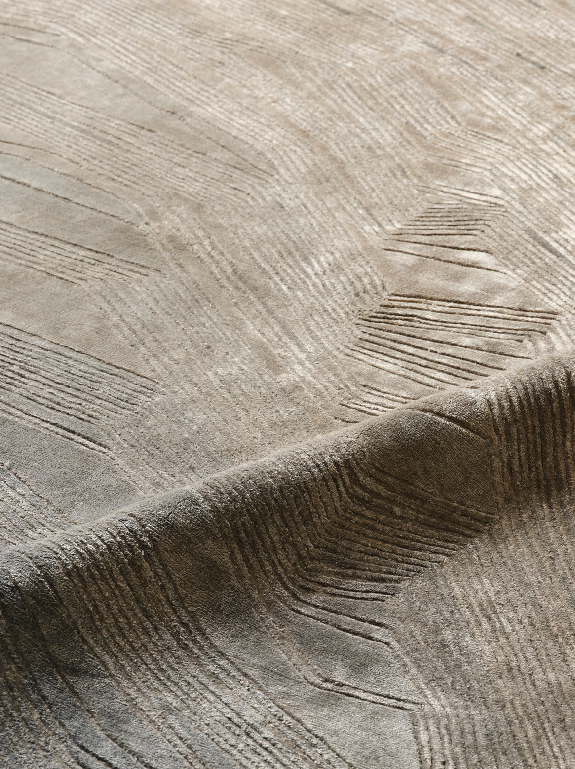 Luxury hand knotted carpet made from 100% Botanical Silk in taupe green color and 5'6" x 8' size