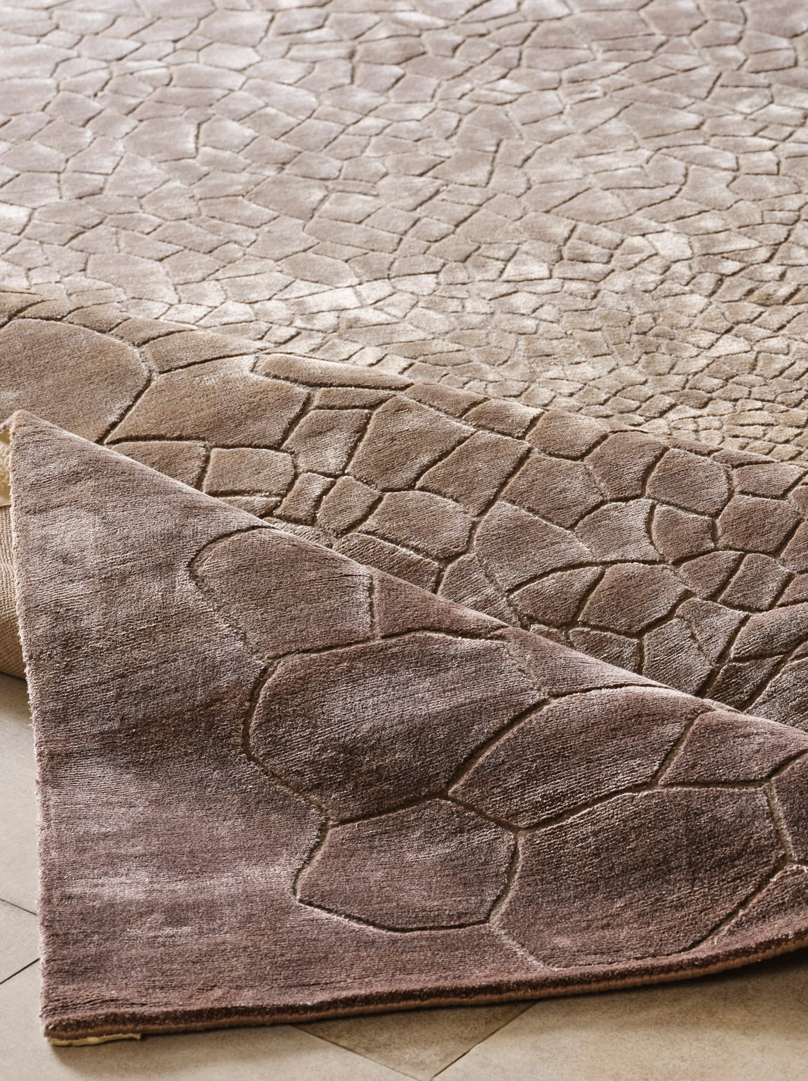 Luxury hand knotted carpet made from 100% Botanical Silk in amber color and 5'6" x 8' size